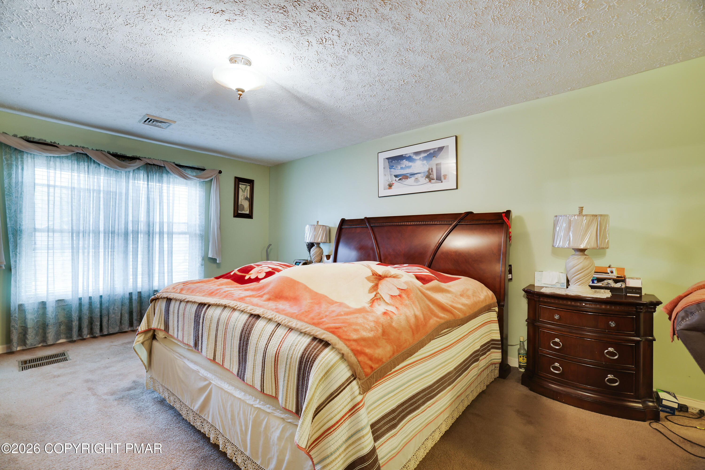 2137 Freedom Way Pocono Summit, PA 18346 - Photo 12 of 71 a bedroom with a bed and window