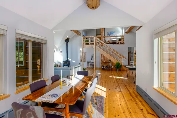 a view of a living room and dining room