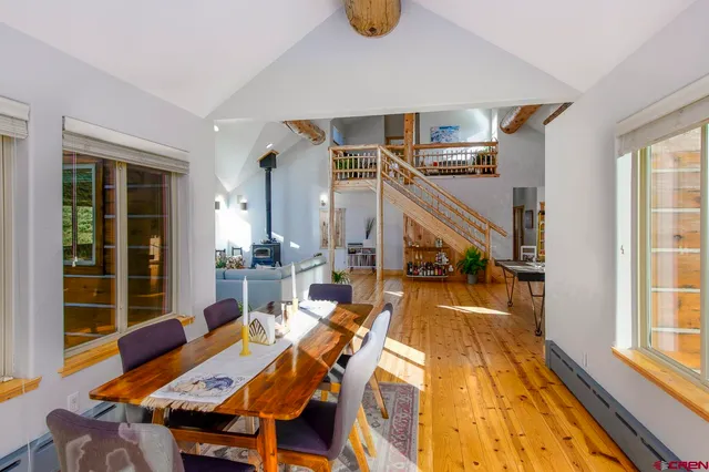 a view of a living room and dining room