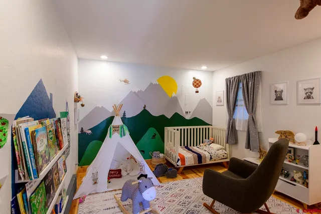 a view of gym equipment and children play room