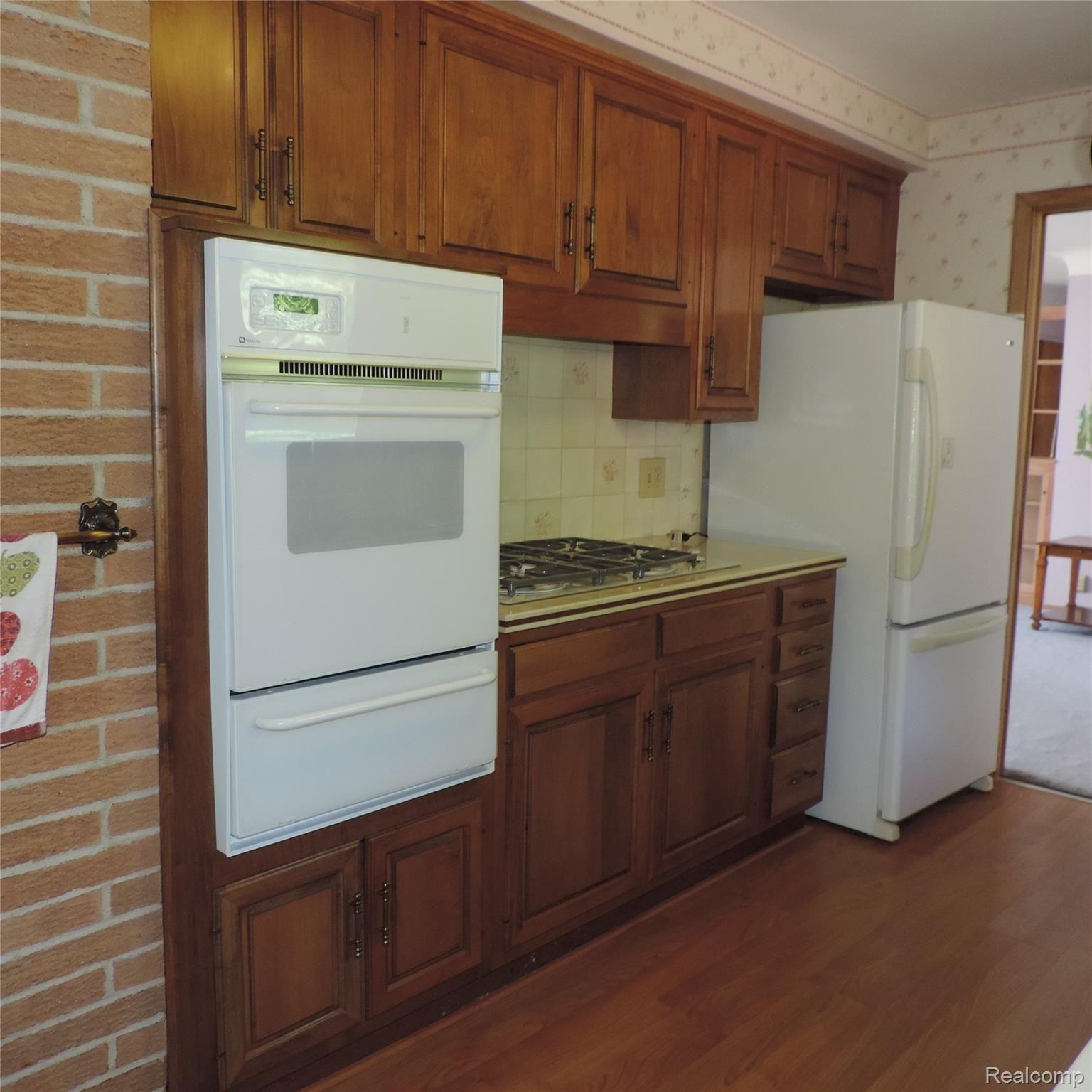 1650 West Predmore Road Oakland, MI 48363 - Photo 4 of 19 all appliances included. corian counters.