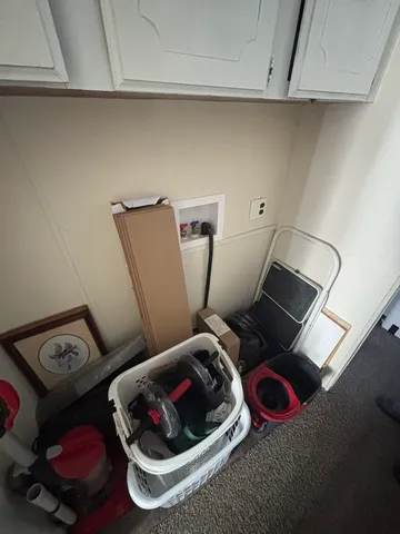 a bathroom with a toilet and a mirror