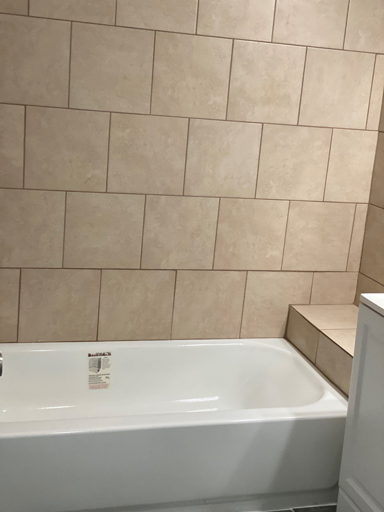 1061 Dunbar Avenue Columbus, GA 31906 - Photo 7 of 11 a bathroom with a bathtub