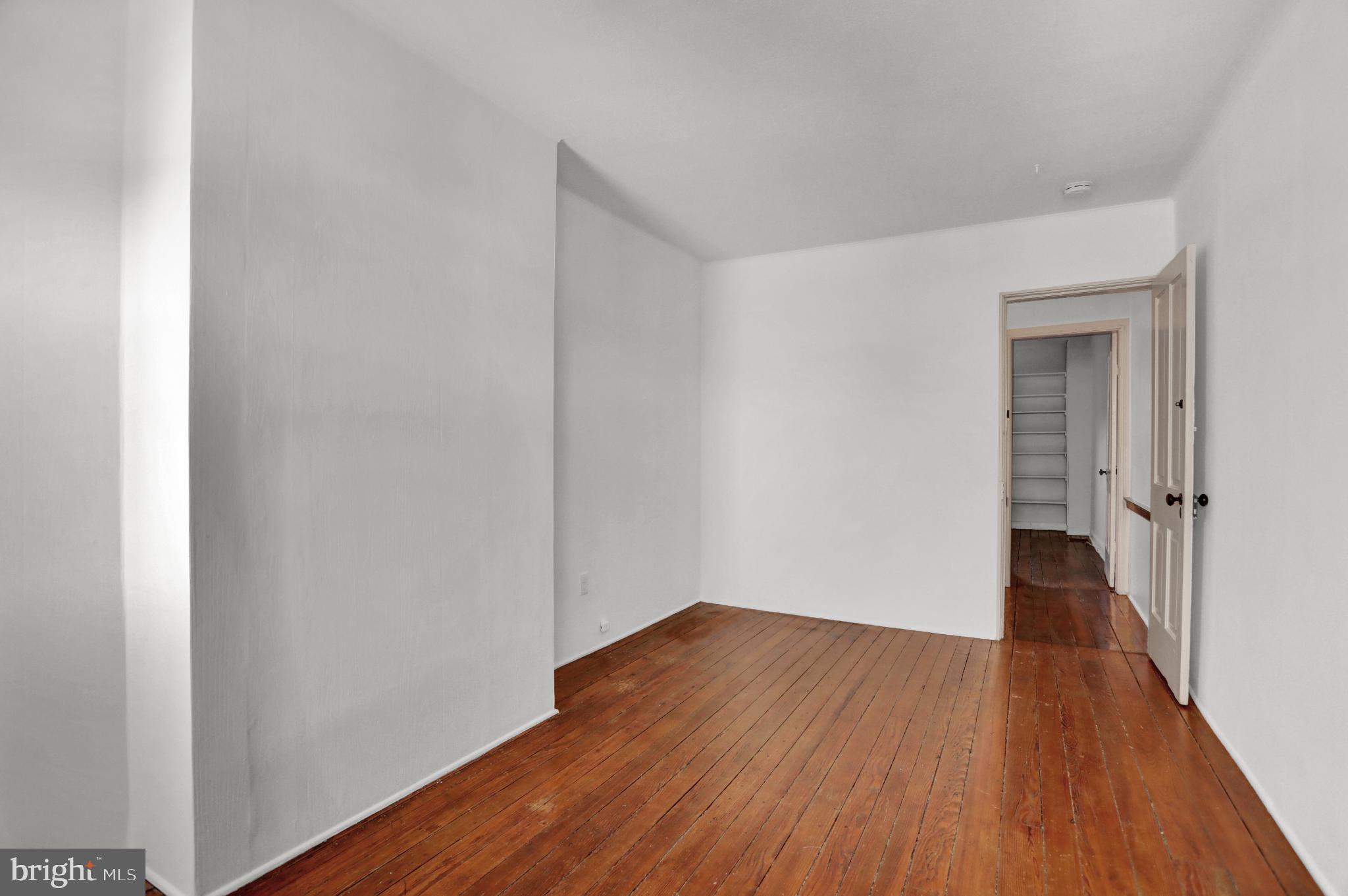 1306 Rutter Street Baltimore, MD 21217 - Photo 18 of 27 a view of a room with wooden floor
