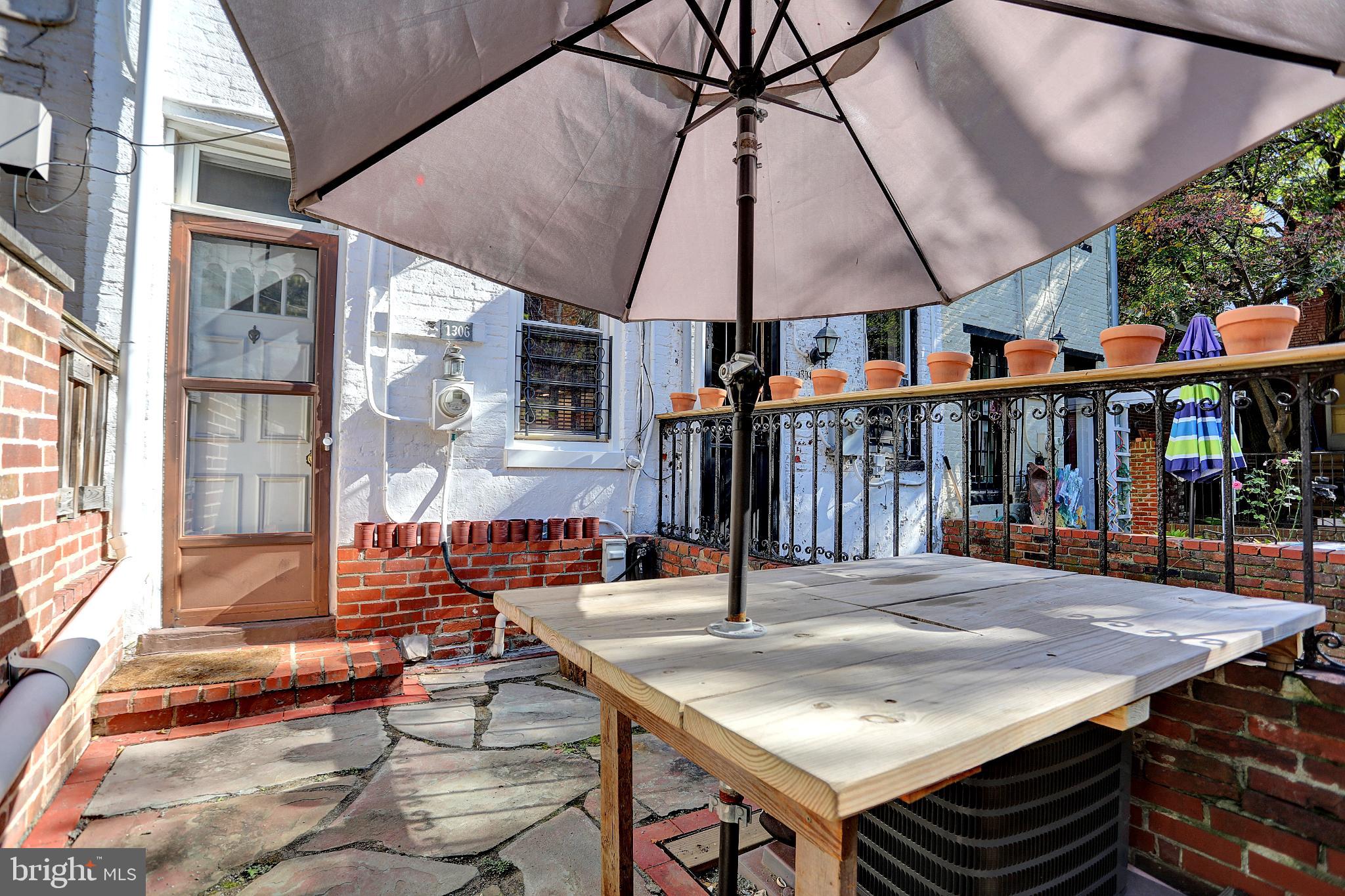 1306 Rutter Street Baltimore, MD 21217 - Photo 10 of 27 a table and chairs in the patio