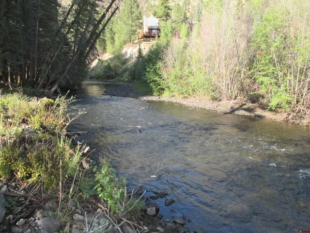 a view of backyard with green space