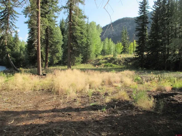 a view of a lake with mountain