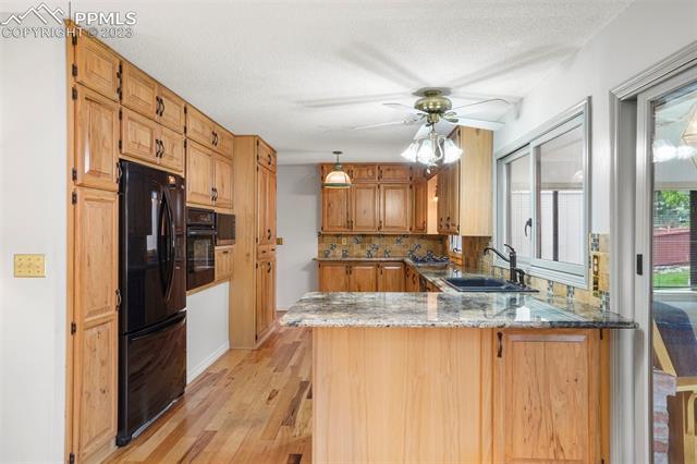2913 Marilyn Road Colorado Springs, CO 80909 - Photo 9 of 34 Updated Kitchen