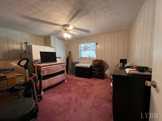 7338 Red House Road Appomattox, VA 24522 - Photo 14 of 28 a bedroom with a bed and a chandelier