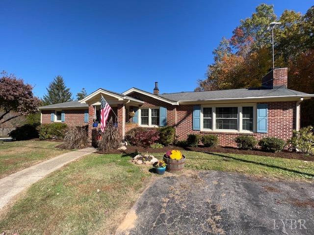 7338 Red House Road Appomattox, VA 24522 - Photo 2 of 28 a front view of a house with a yard