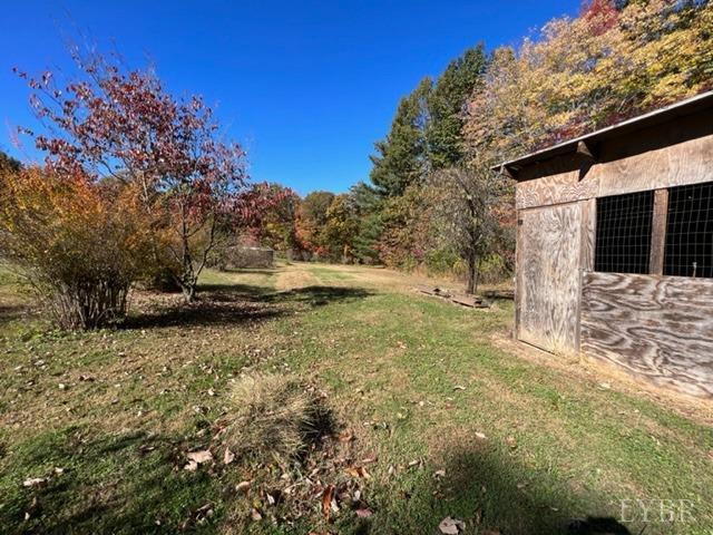 7338 Red House Road Appomattox, VA 24522 - Photo 21 of 28 a view of a yard with wooden fence