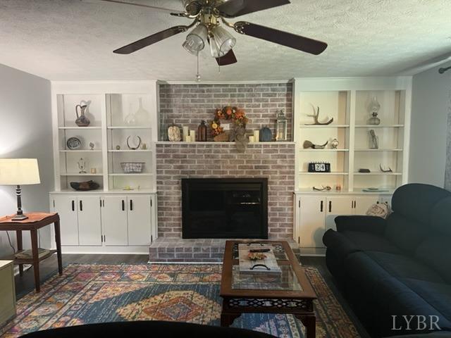 7338 Red House Road Appomattox, VA 24522 - Photo 6 of 28 a living room with furniture and a fireplace