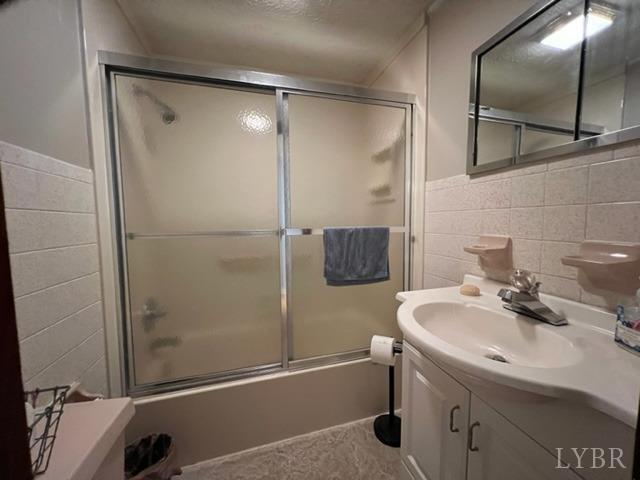 7338 Red House Road Appomattox, VA 24522 - Photo 10 of 28 a bathroom with a sink and a mirror
