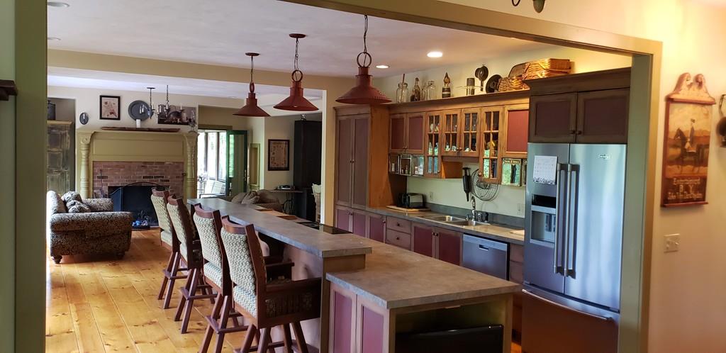 798 Barre Road Templeton, MA 01468 - Photo 14 of 25 a open kitchen with stainless steel appliances granite countertop a stove and a refrigerator