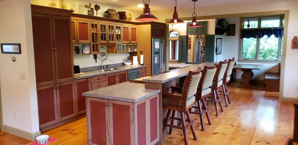 798 Barre Road Templeton, MA 01468 - Photo 15 of 25 a view of a dining room with furniture window and wooden floor