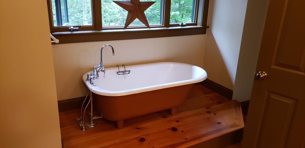 798 Barre Road Templeton, MA 01468 - Photo 21 of 25 a bathroom with a sink and a window