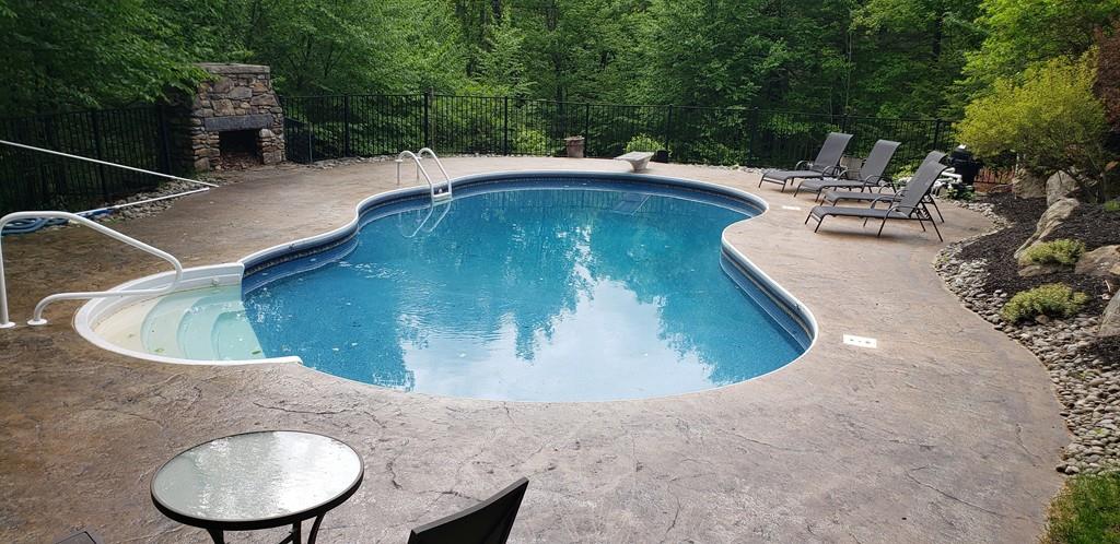 798 Barre Road Templeton, MA 01468 - Photo 8 of 25 a view of a swimming pool with a patio