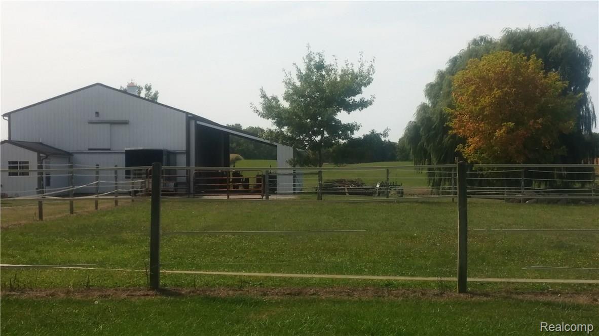 651 Burkley Road Mason, MI 48854 - Photo 6 of 47 Front view of Horse Barn and outdoor arena