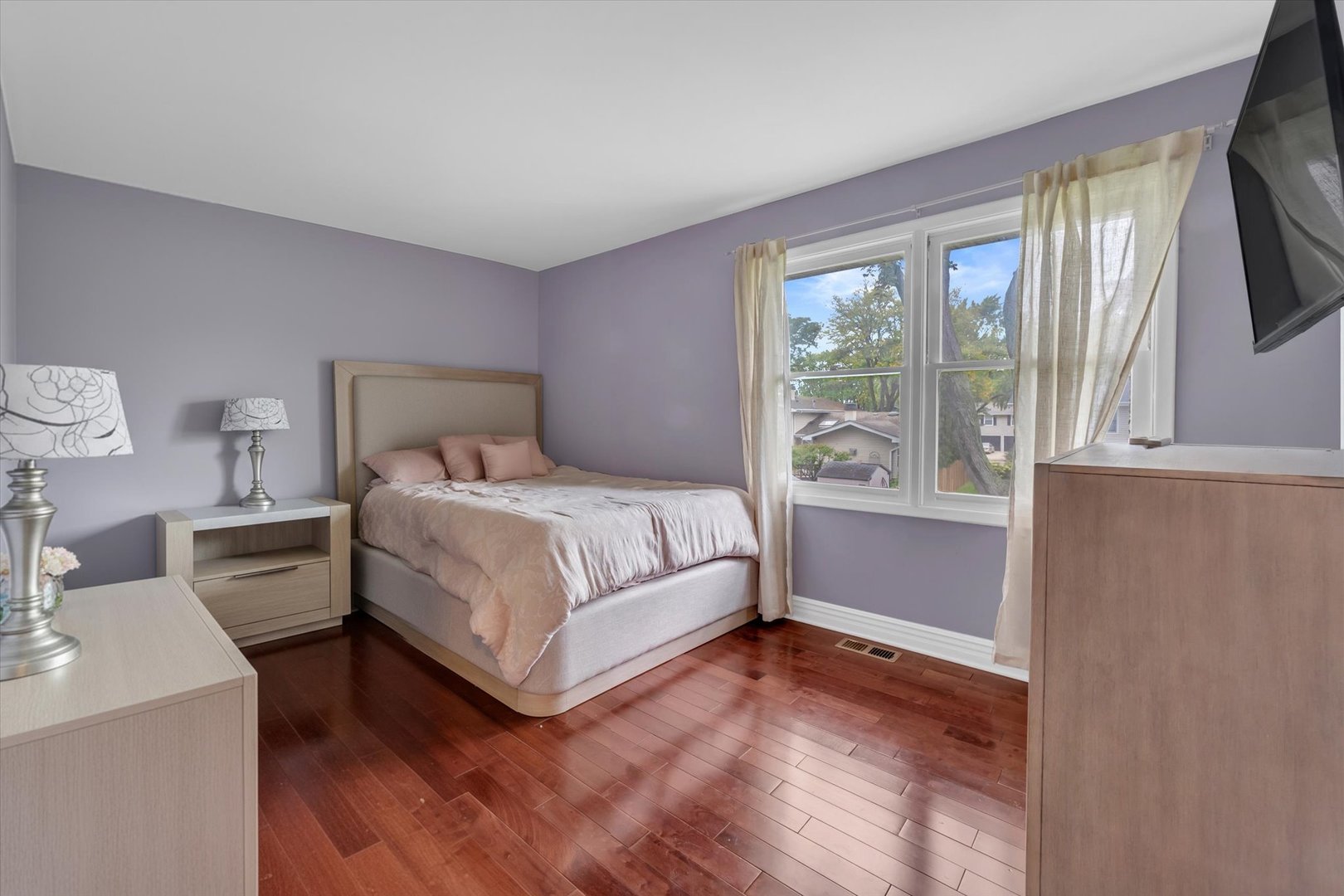 1352 West Oakmont Road Hoffman Estates, IL 60169 - Photo 28 of 42 a bedroom with a large bed and a large window