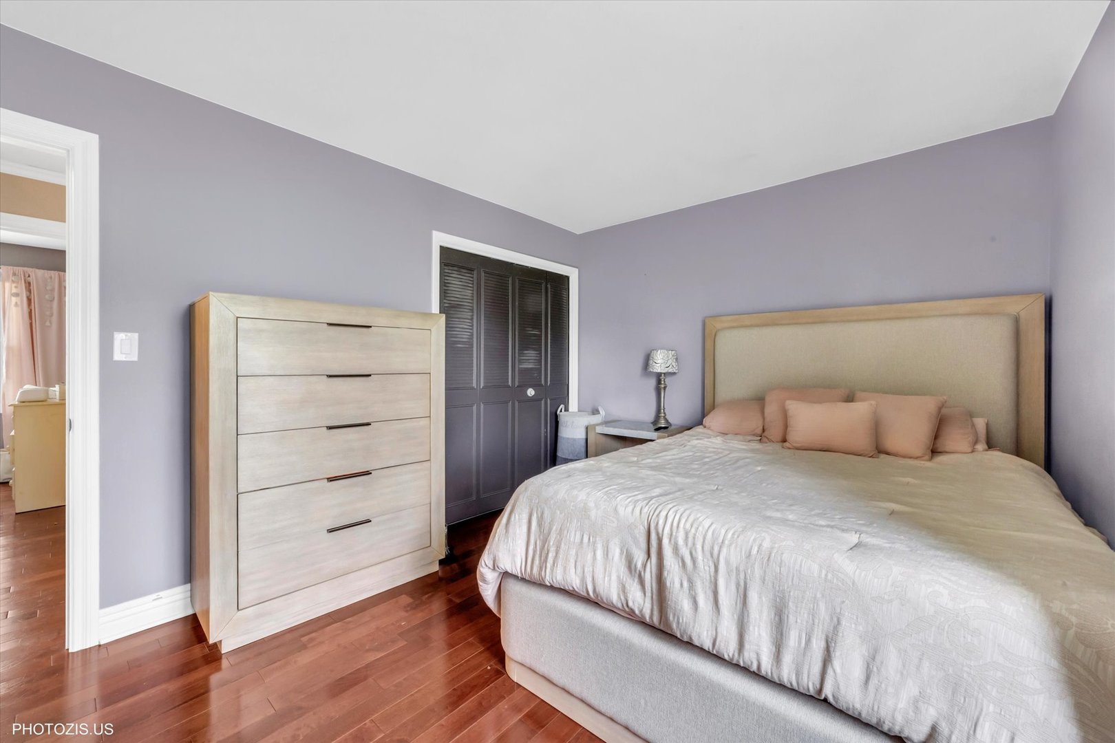 1352 West Oakmont Road Hoffman Estates, IL 60169 - Photo 29 of 42 a bedroom with a bed and a dresser