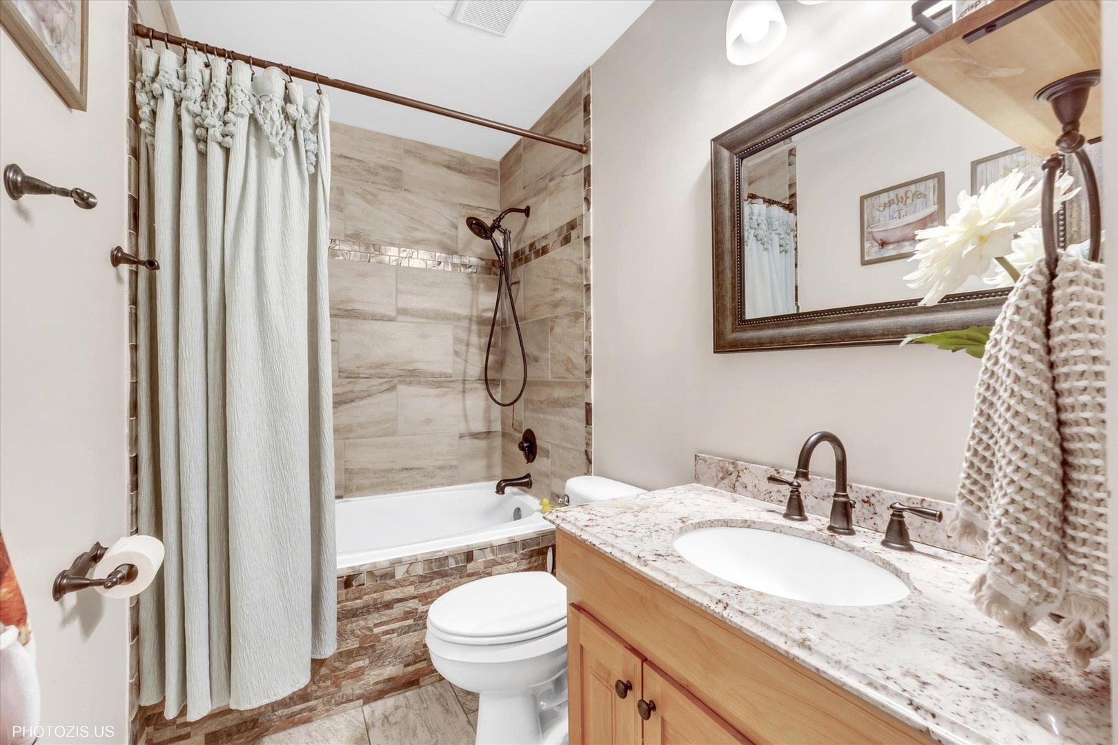 1352 West Oakmont Road Hoffman Estates, IL 60169 - Photo 32 of 42 a bathroom with a granite countertop sink toilet and shower