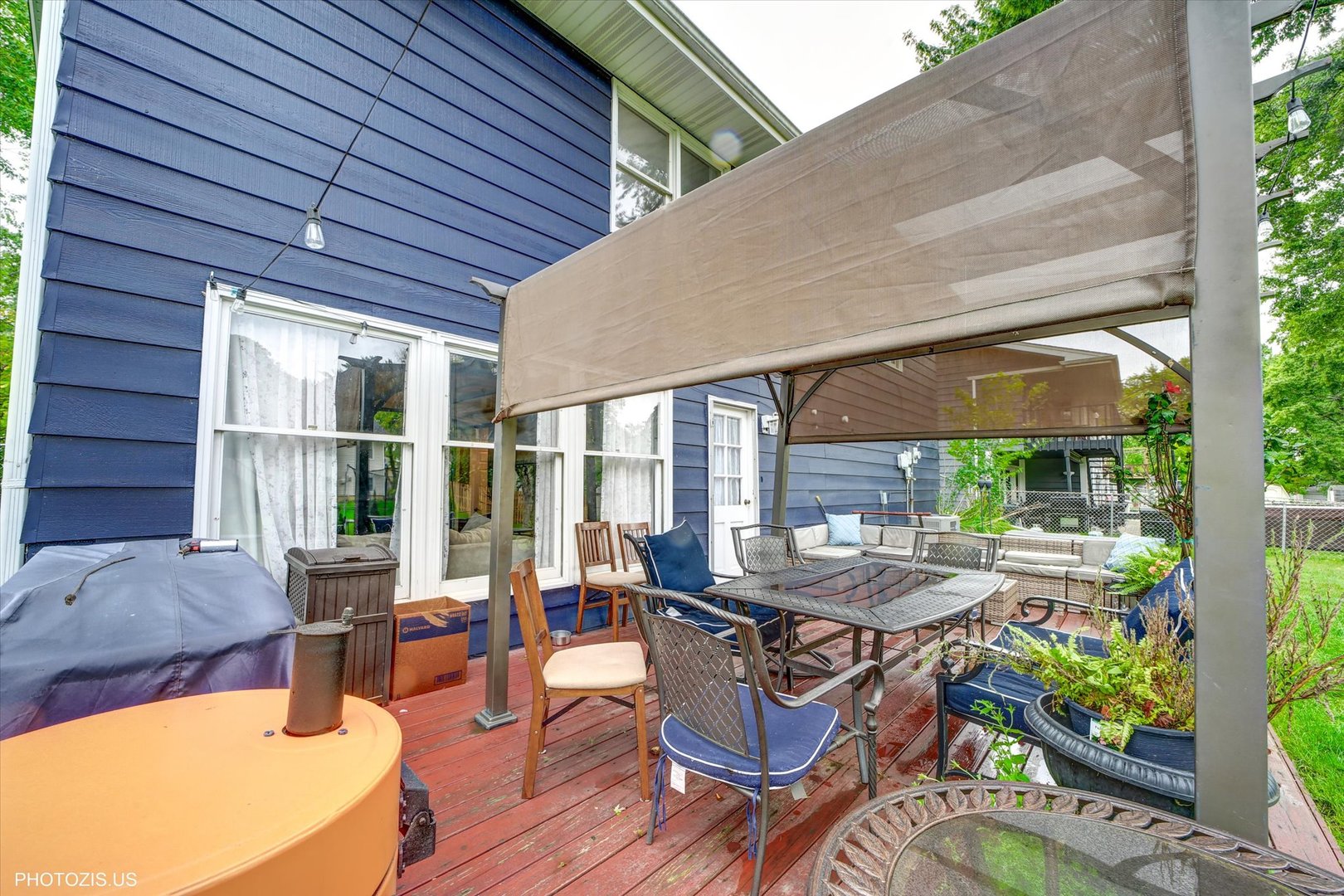 1352 West Oakmont Road Hoffman Estates, IL 60169 - Photo 8 of 42 a patio with glass top table and chairs