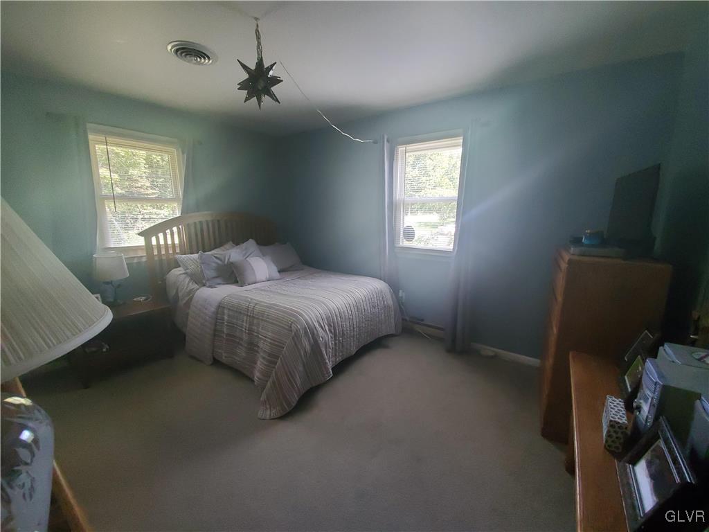 3556 Mountain Road Slatington, PA 18080 - Photo 8 of 31 a bedroom with a bed and a window