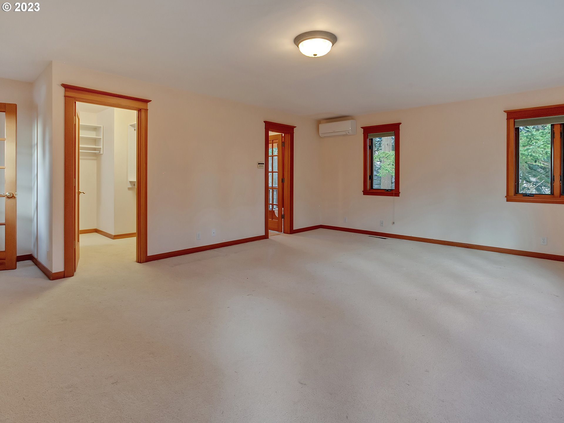 11310 Northwest Plainview Road Portland, OR 97231 - Photo 18 of 32 an empty room with windows