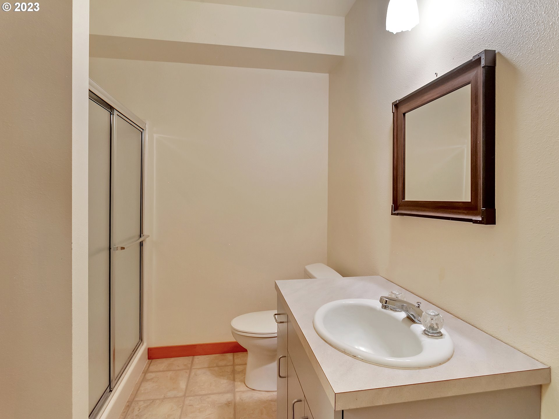 11310 Northwest Plainview Road Portland, OR 97231 - Photo 27 of 32 a bathroom with a sink a toilet and shower