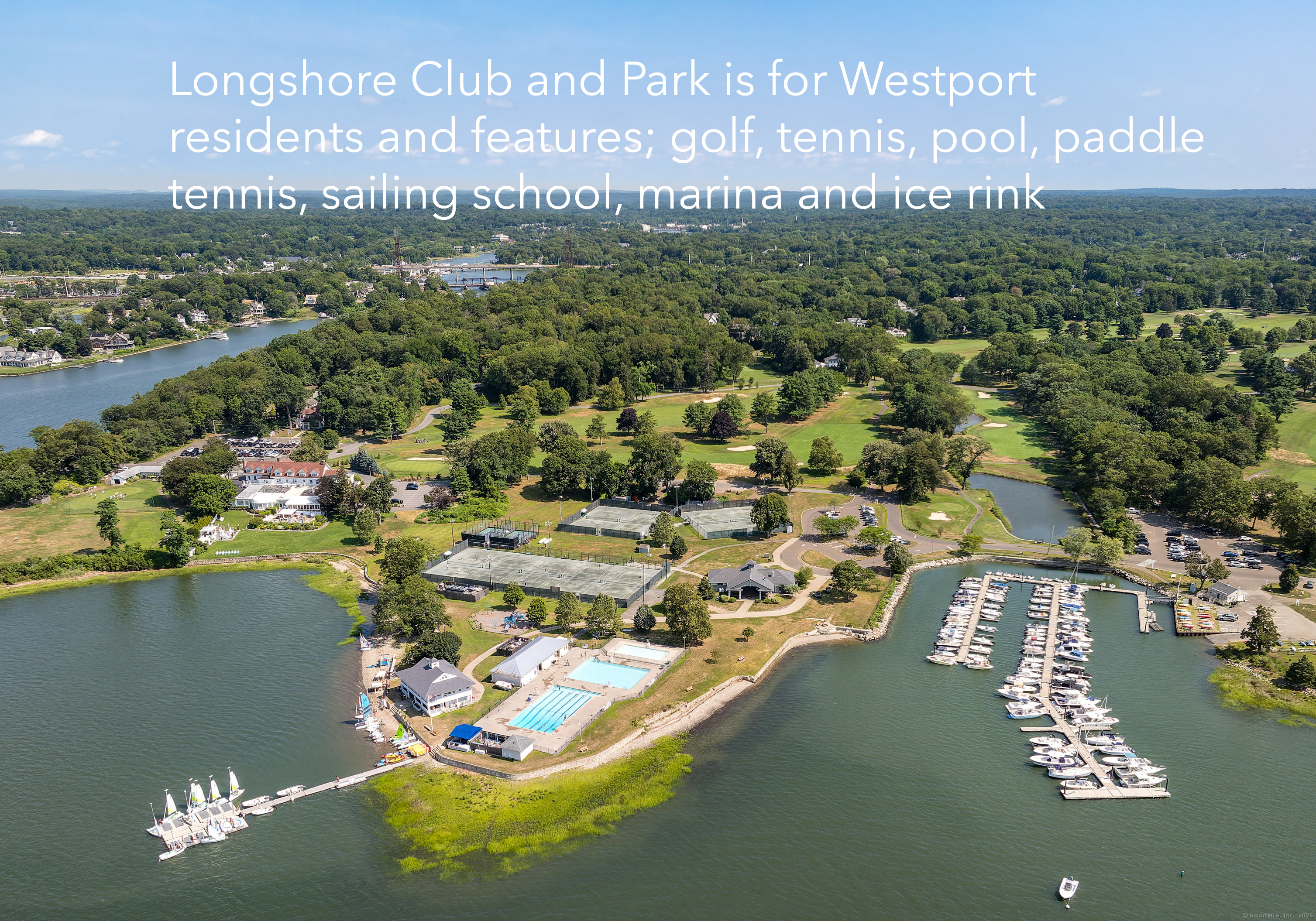 785 Post Road East, Unit 102 Westport, CT 06880 - Photo 34 of 40 an aerial view of residential houses with outdoor space