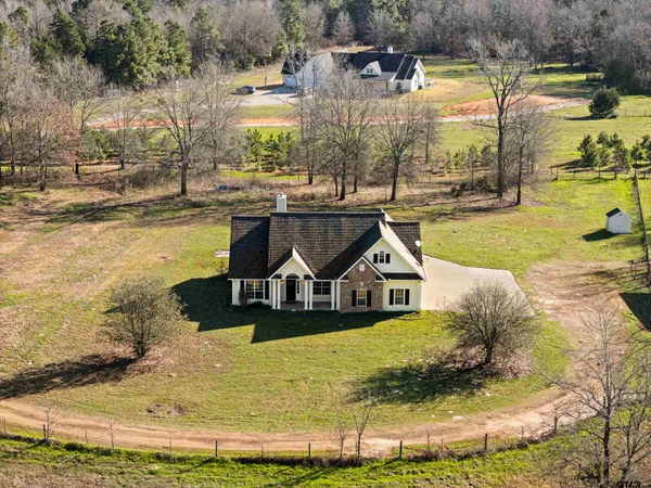 a view of a swimming pool with an outdoor space