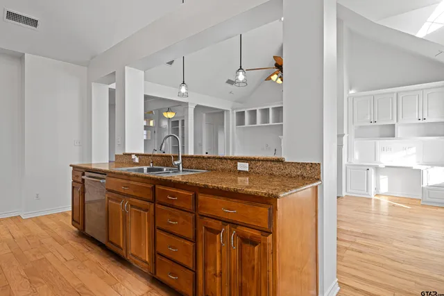 a bathroom with a sink and toilet