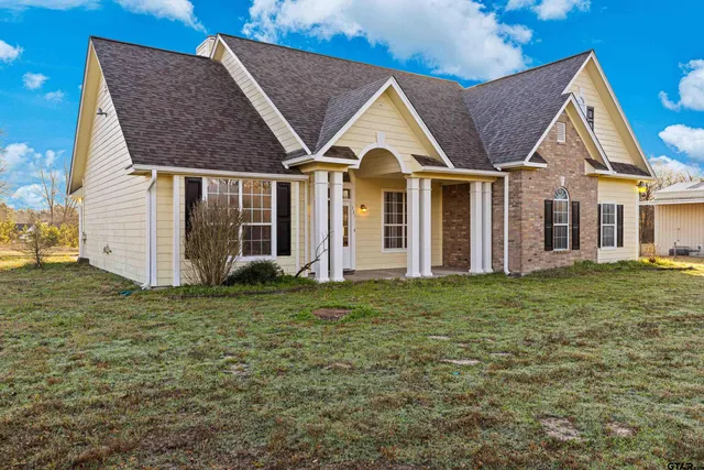 a view of a house with a swimming pool