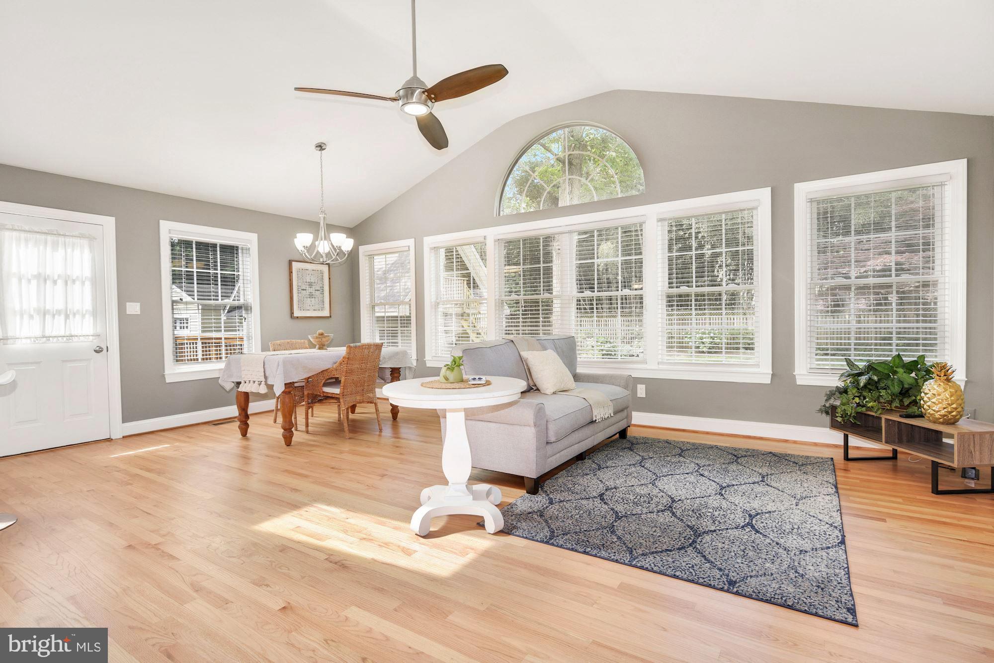 1005 Old Bay Ridge Road Annapolis, MD 21403 - Photo 12 of 56 Can we talk about the entire wall of windows?