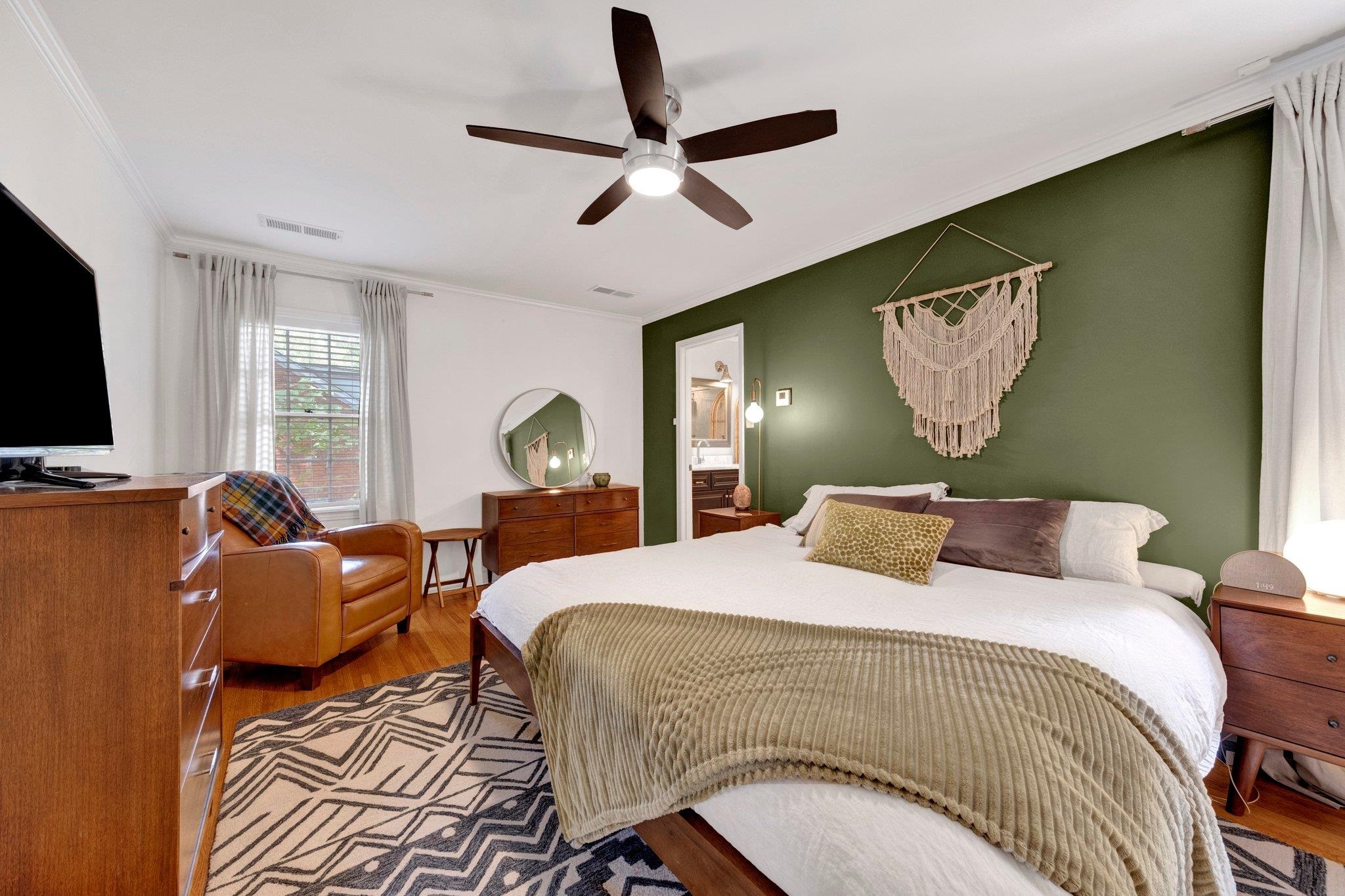 5543 Walnut Grove Road Memphis, TN 38120 - Photo 17 of 25 a bedroom with a bed and window