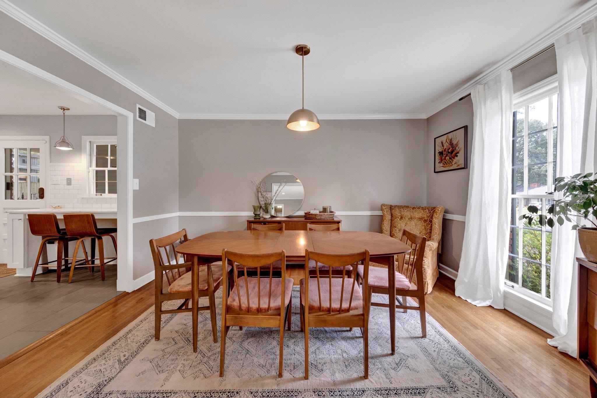5543 Walnut Grove Road Memphis, TN 38120 - Photo 9 of 25 a view of a dining room with furniture window and wooden floor