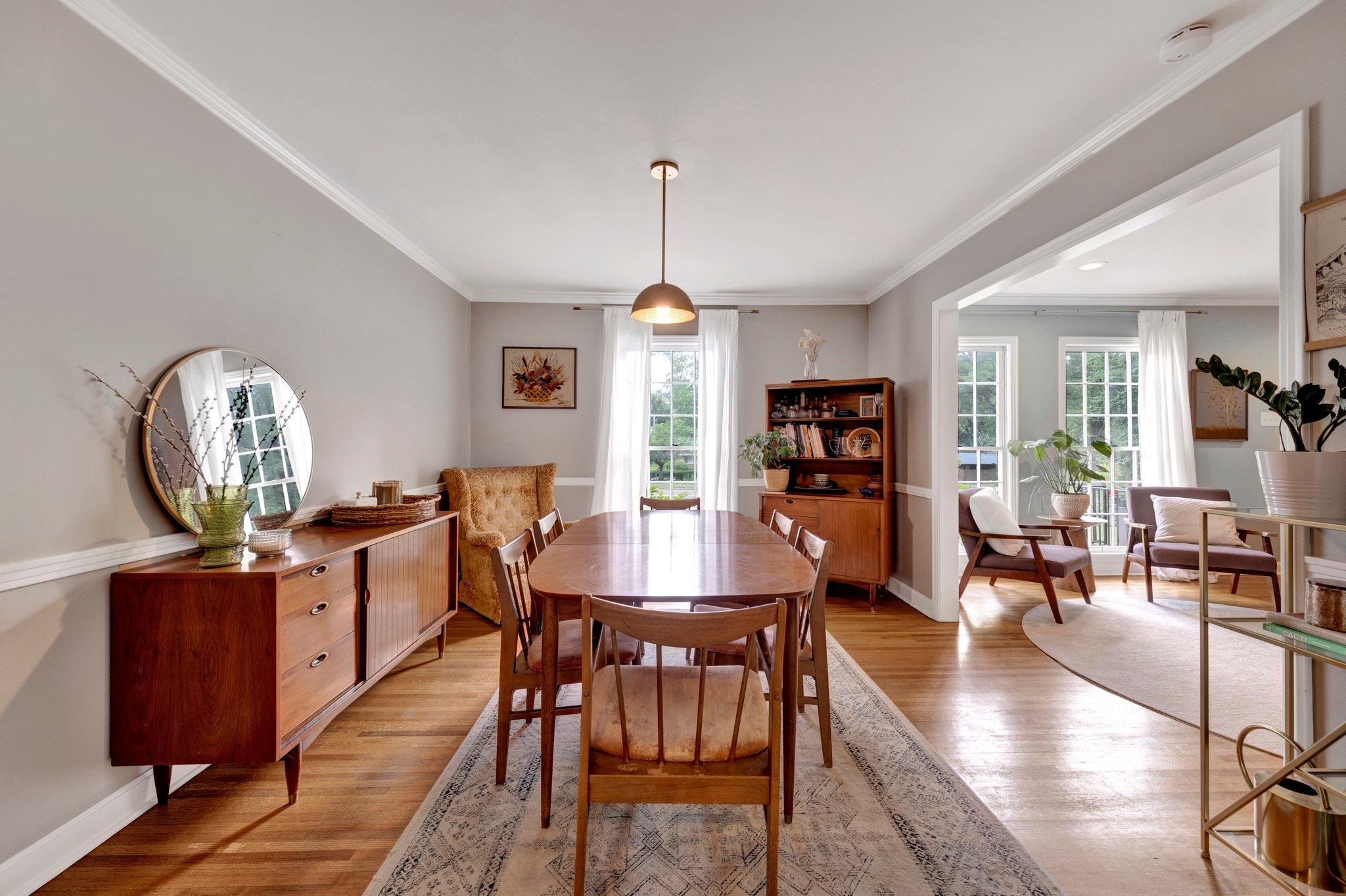 5543 Walnut Grove Road Memphis, TN 38120 - Photo 10 of 25 a view of a dining room with furniture window and wooden floor