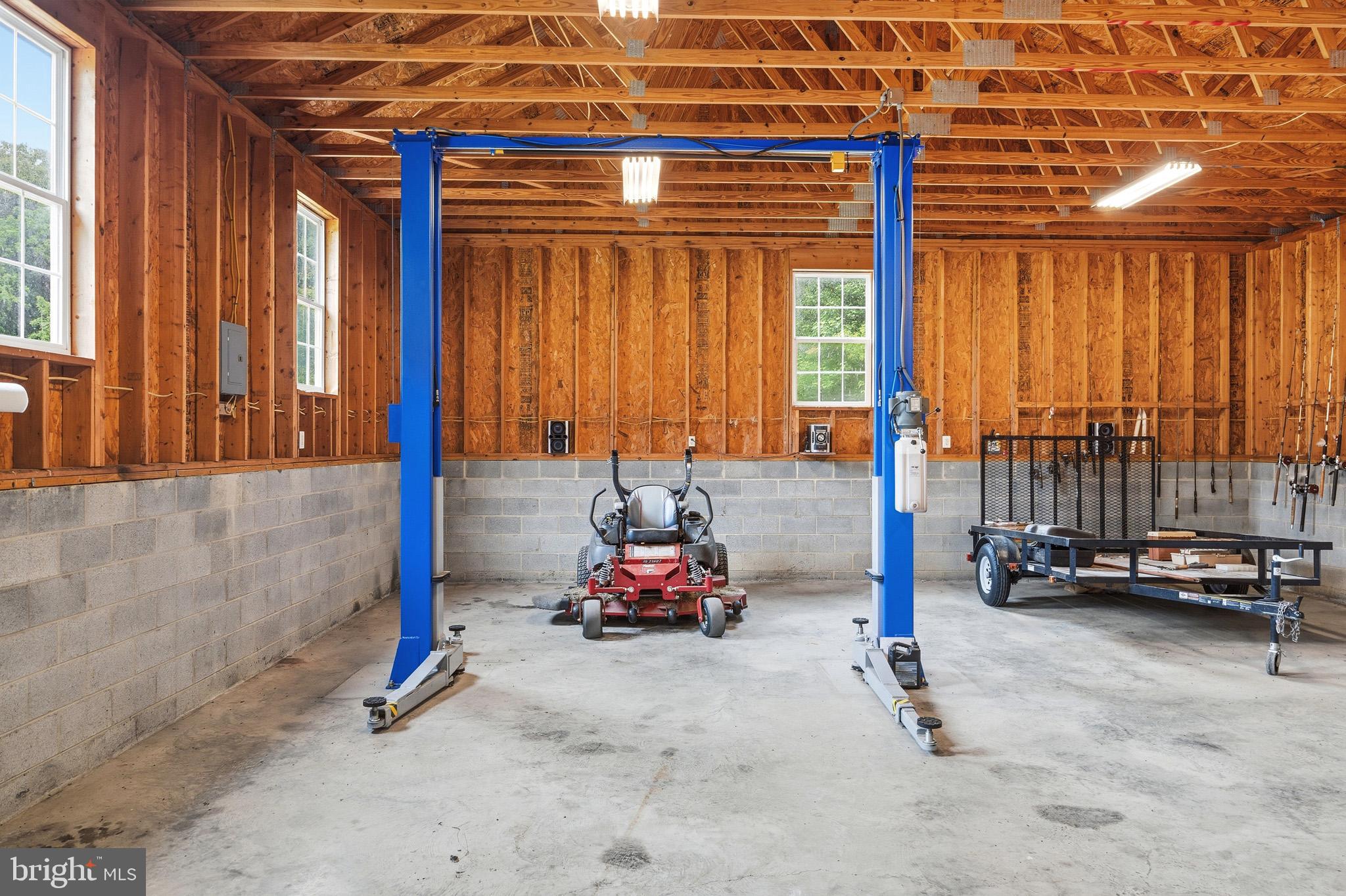 4570 Hawthorne Road Indian Head, MD 20640 - Photo 5 of 82 Garage bay w/ car lift