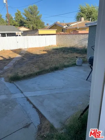 a view of a pathway both side of building