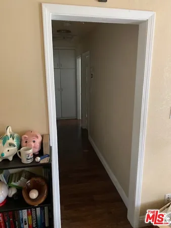 a room with toys and wooden floor