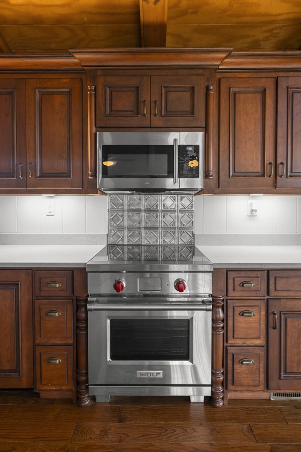 3778 Highway 100 Centerville, TN 37033 - Photo 13 of 59 a stove top oven sitting inside of a kitchen