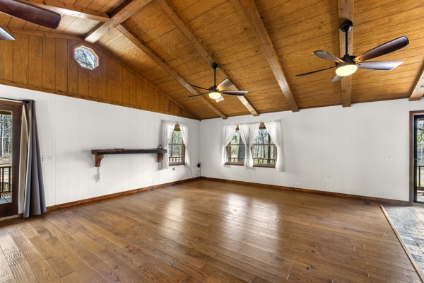 3778 Highway 100 Centerville, TN 37033 - Photo 14 of 59 a view of an empty room with wooden floor