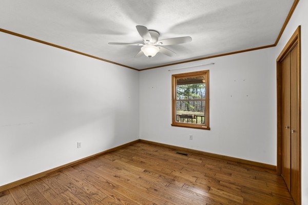 3778 Highway 100 Centerville, TN 37033 - Photo 19 of 59 wooden floor in an empty room with a window