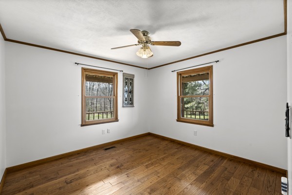 3778 Highway 100 Centerville, TN 37033 - Photo 20 of 59 a view of an empty room with a window and wooden floor
