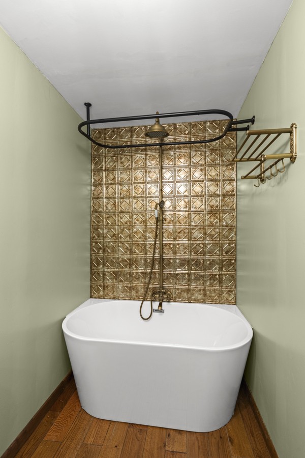 3778 Highway 100 Centerville, TN 37033 - Photo 24 of 59 a bathroom with a bathtub and shower