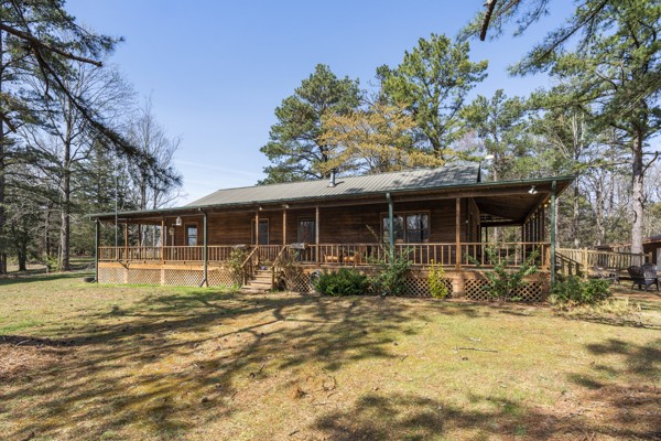 3778 Highway 100 Centerville, TN 37033 - Photo 3 of 59 a front view of a house with a yard