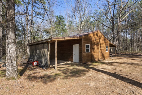 3778 Highway 100 Centerville, TN 37033 - Photo 32 of 59 a view of a house with a yard
