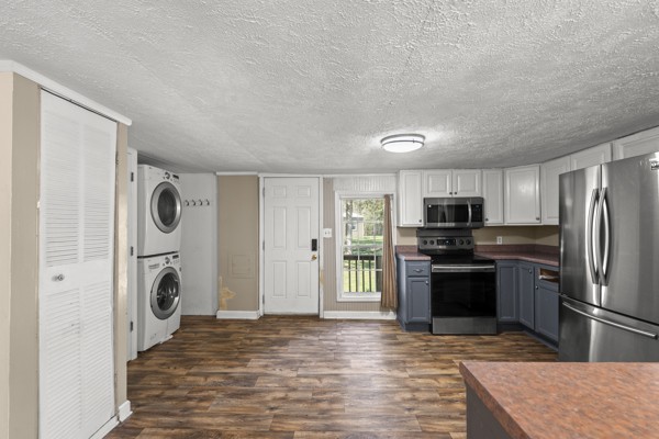 3778 Highway 100 Centerville, TN 37033 - Photo 46 of 59 a view of a kitchen with refrigerator stove and wooden floor