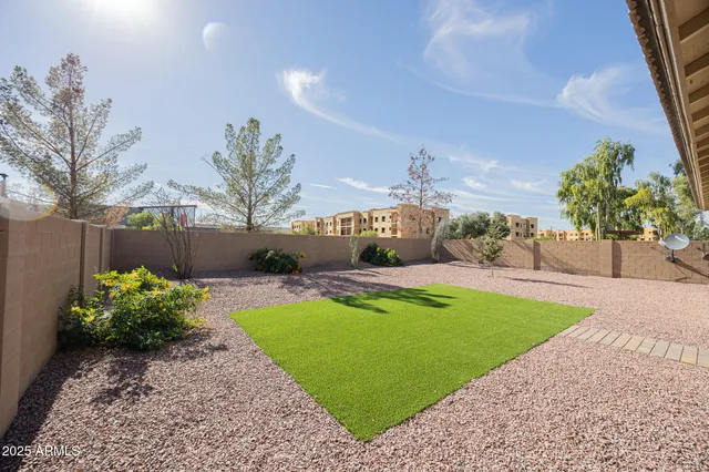 a view of a backyard with a garden