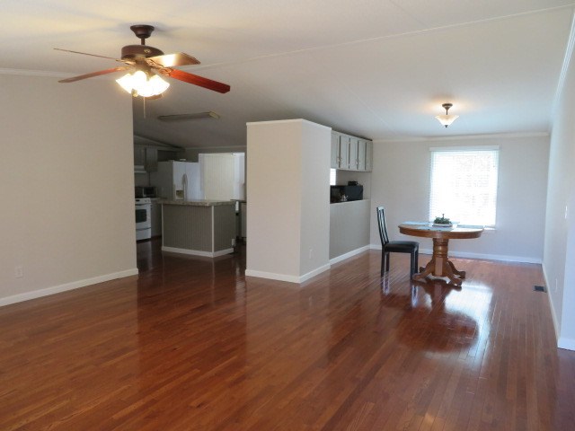574 Fort Perry Road Box Springs, GA 31801 - Photo 2 of 39 View from front door to LR, DR, and kitchen